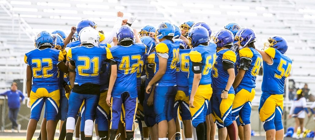 football team huddle